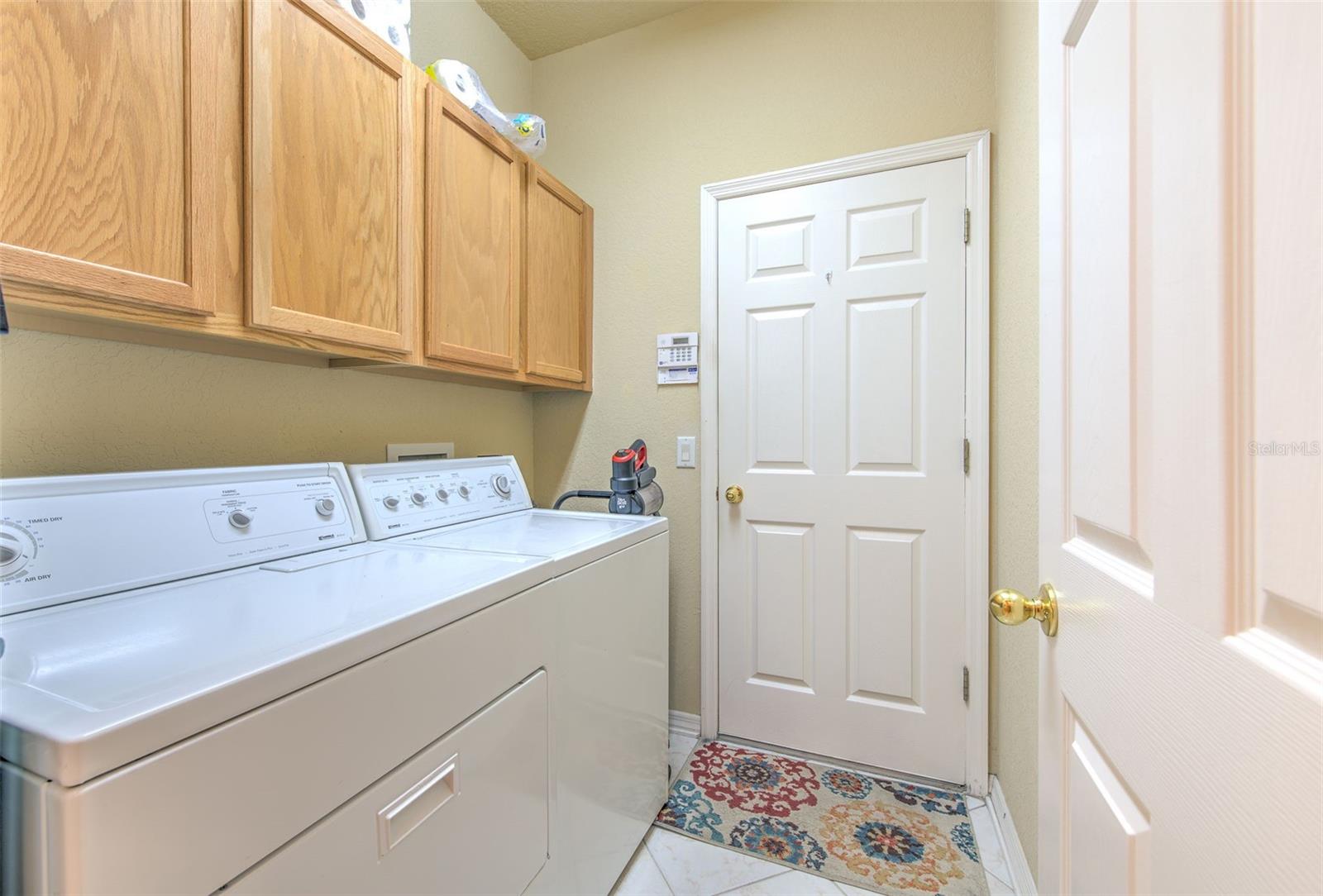 Large laundry leading to garage!