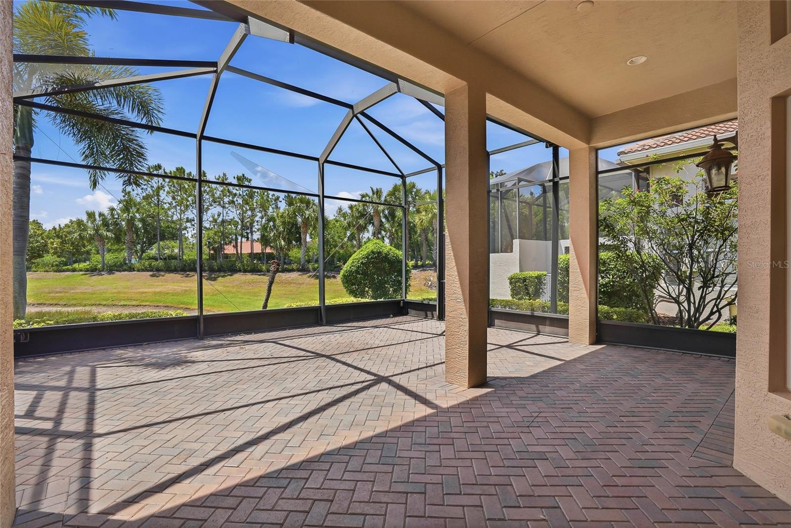 HUGE LANAI with CUSTOM PAVERS - Look at this VIEW!