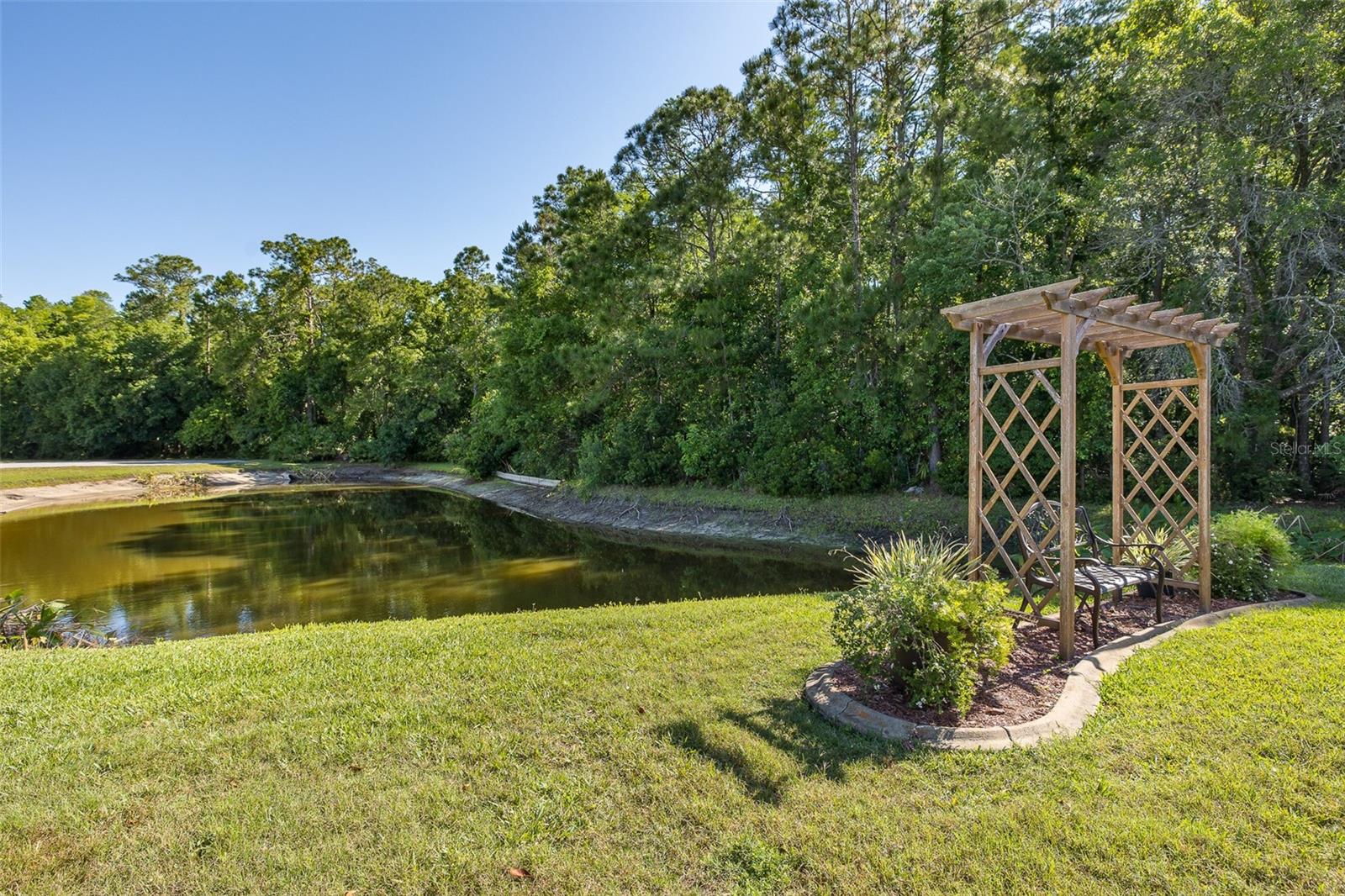 OVER 1/3 ACRE POND VIEW.
