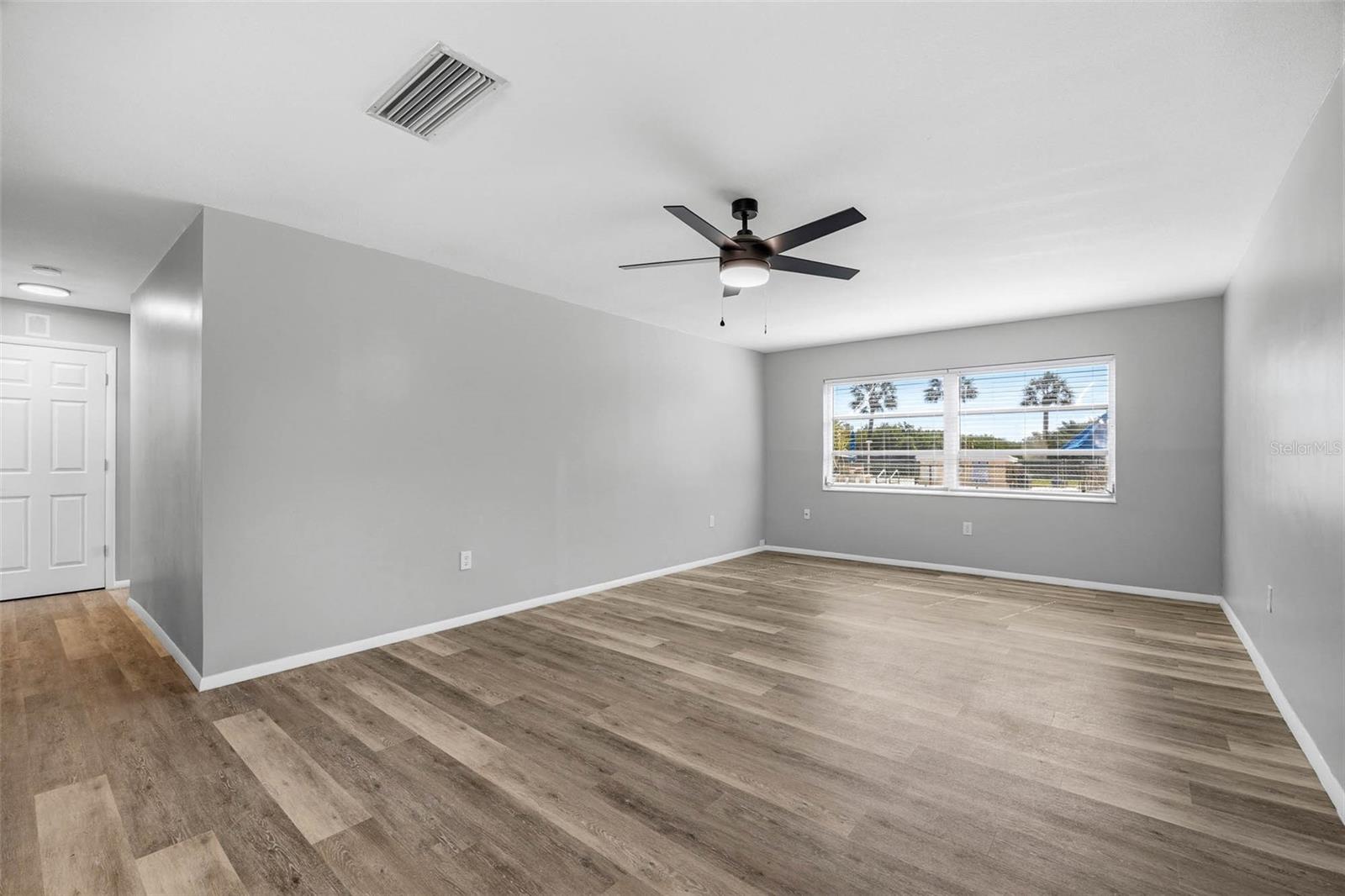 Living Room overlooking Community Pool