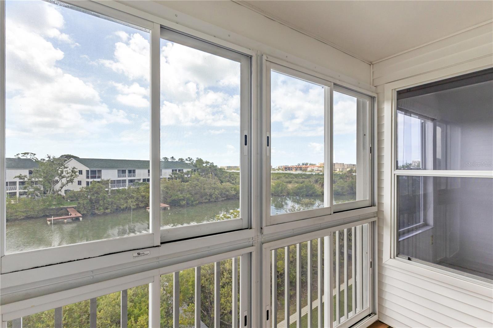 Primary suite screened in balcony