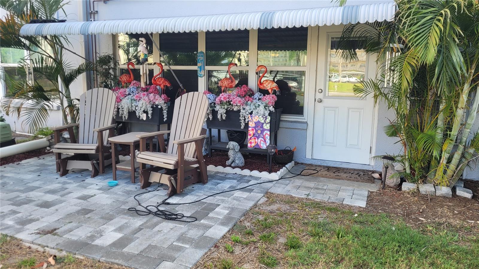 Inviting patio with hurricane awning