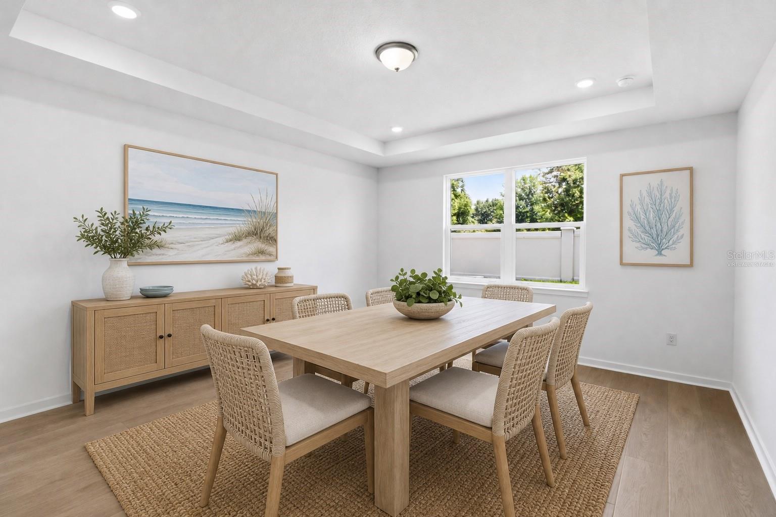 Virtually staged flex room ideal for dining, working, reading, or creative use.