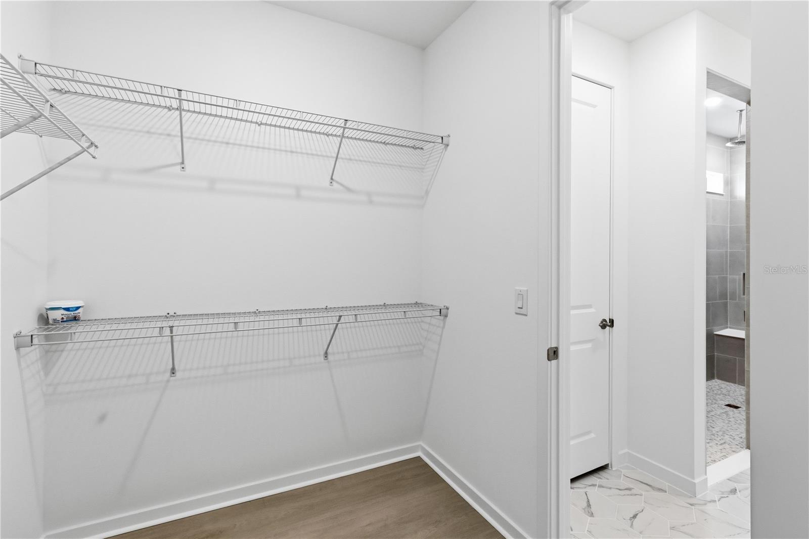 Generous storage with built in shelving and room to keep life organized.