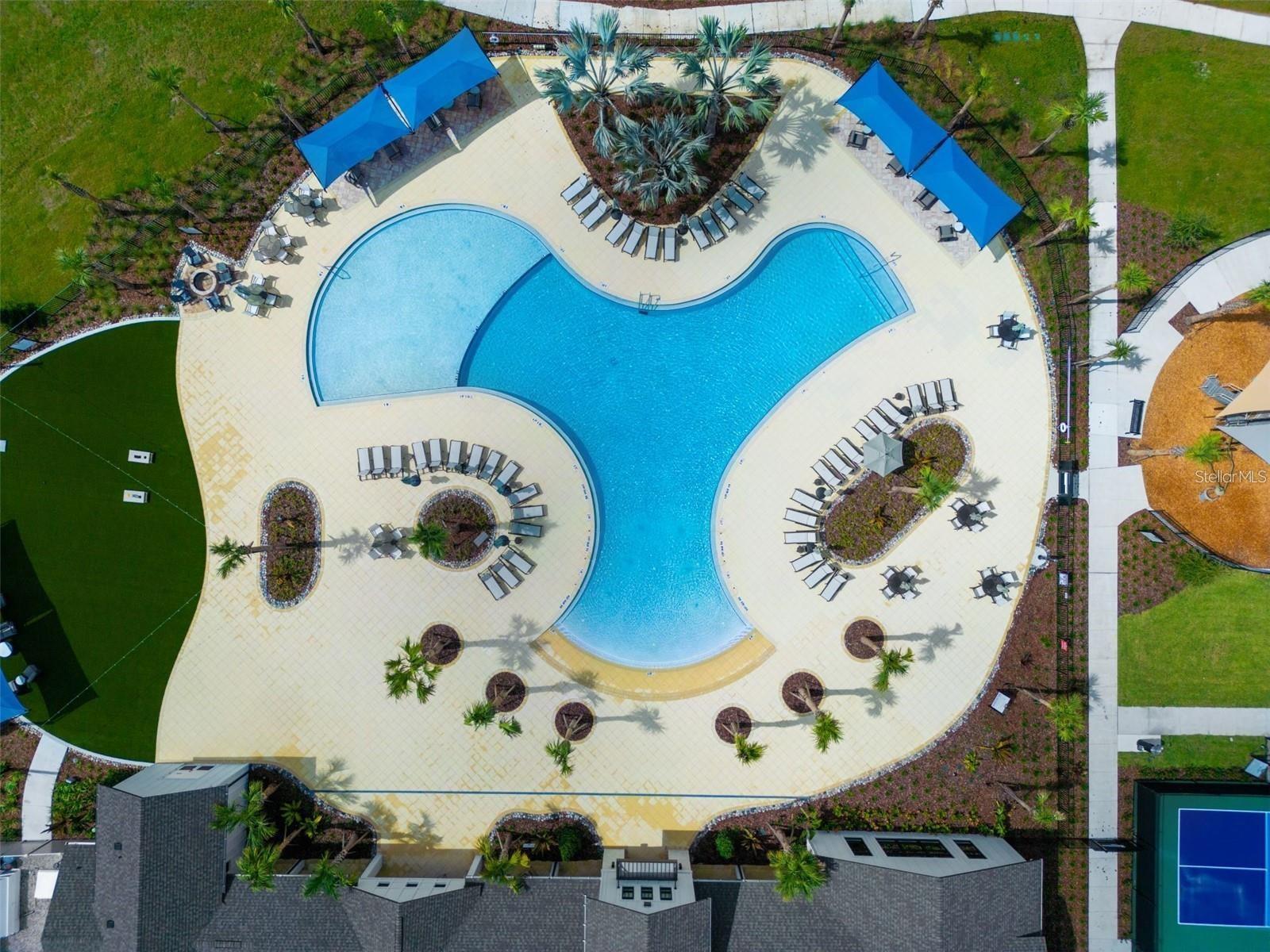 Aerial view of the resort style pool and outdoor amenity area.