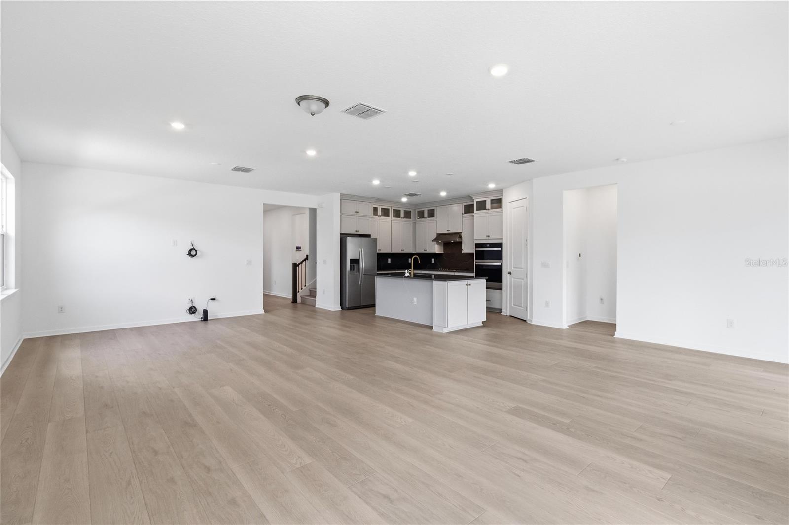 Wide open layout gives the home a light, relaxed, and welcoming feel.