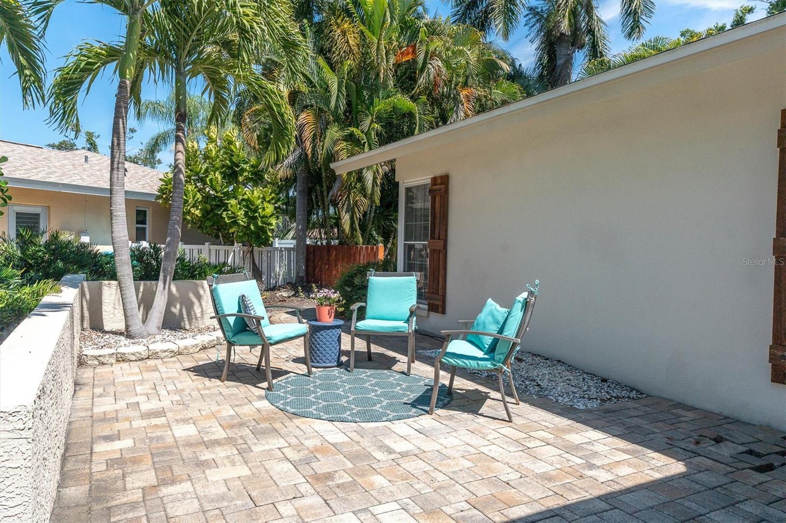 Large covered front patio perfect for outdoor seating and relaxing.