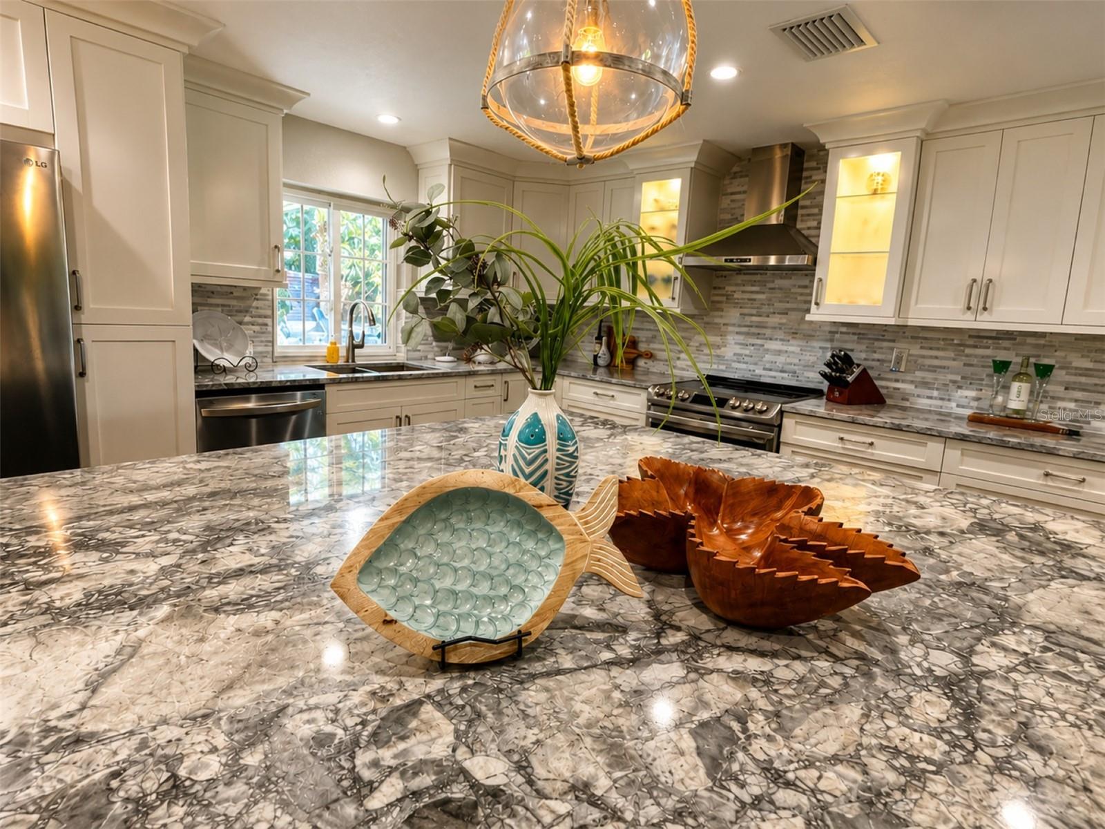 Exquisite granite countertops throughout.