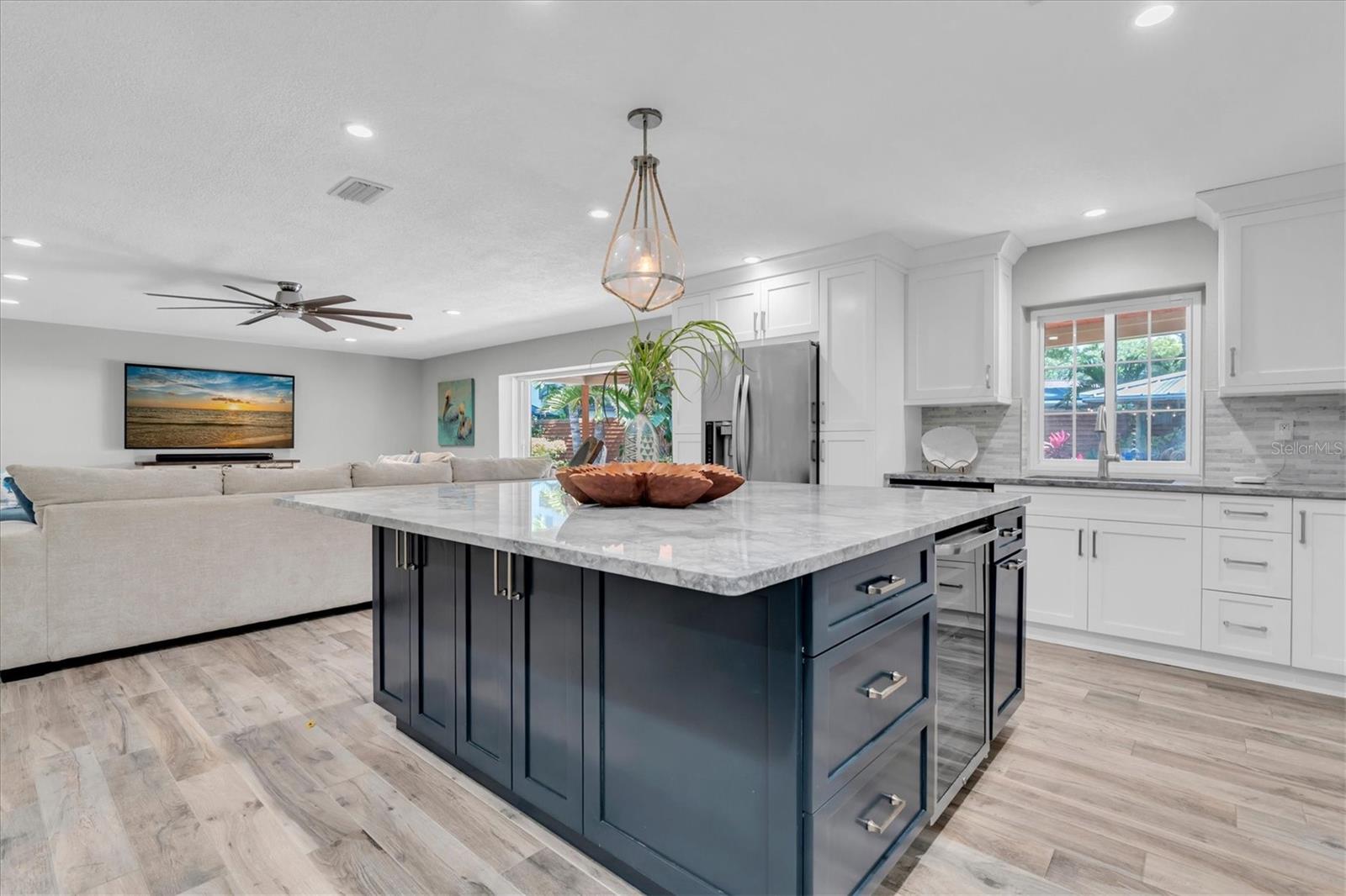Custom cabinetry, granite, and designer finishes.