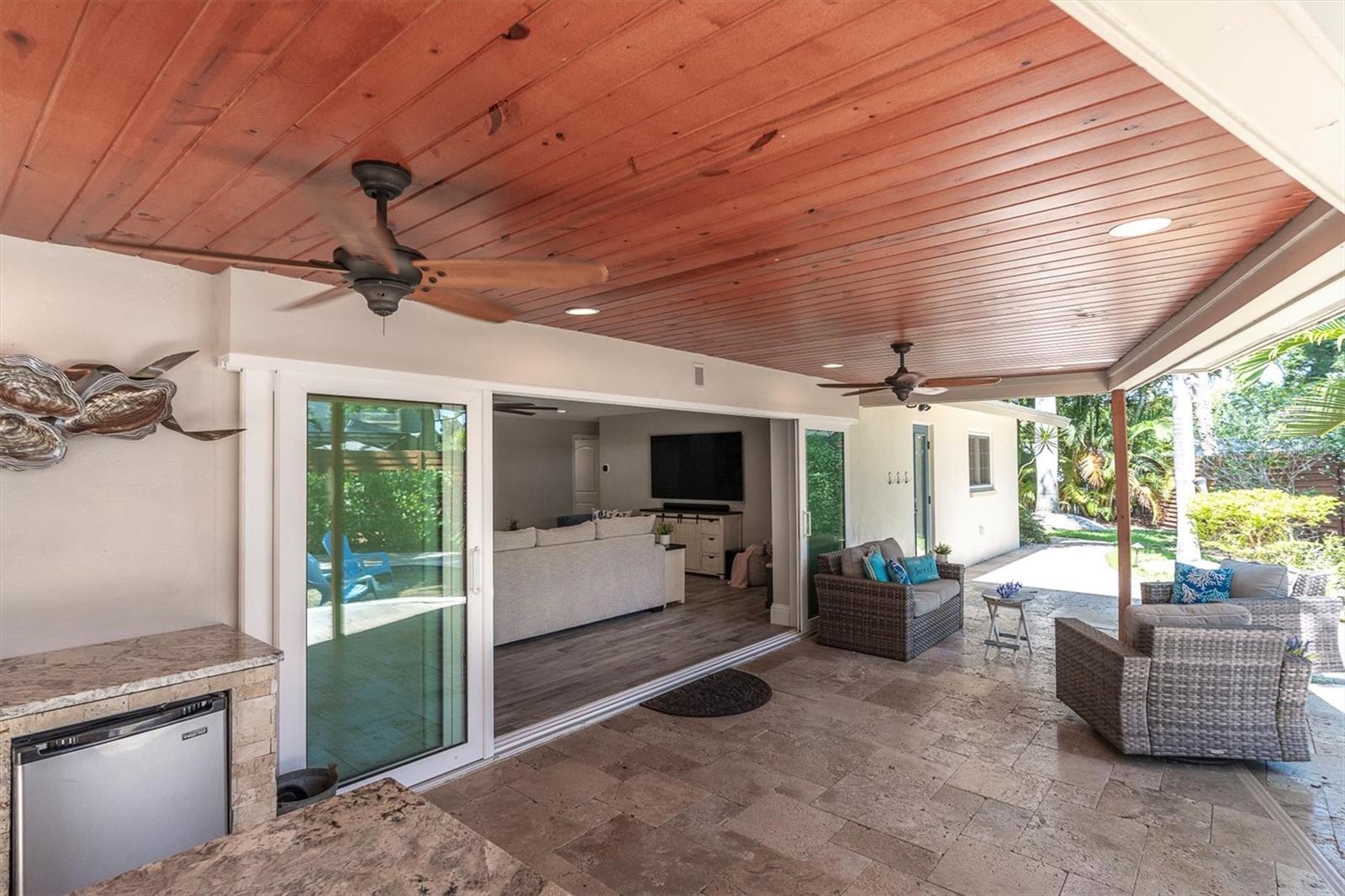 Covered LanaiTongue-and-groove ceilings elevate the outdoor space.
