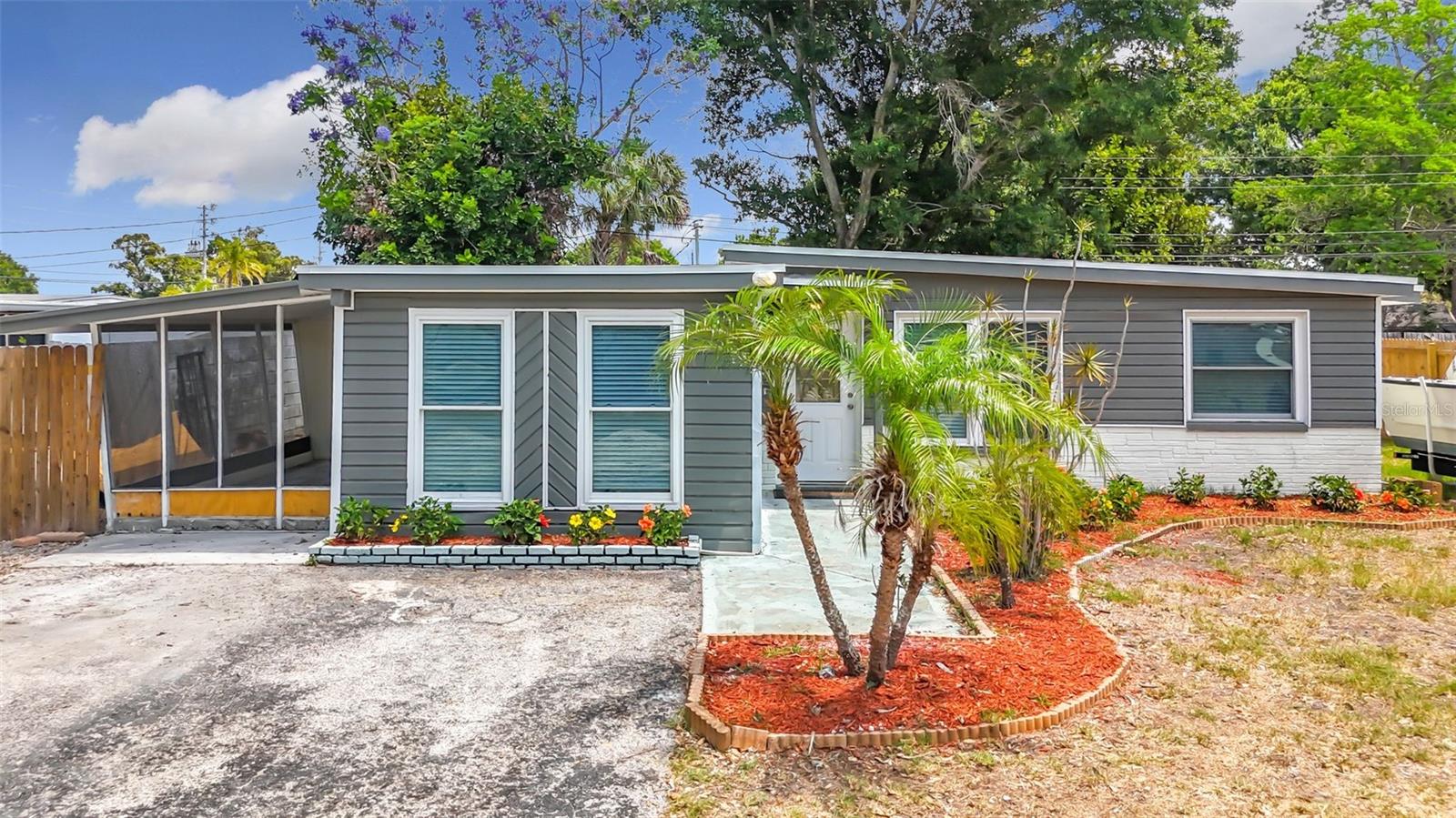 Completely renovated block home offering 4 bedrooms and 2.5 baths, ready for immediate move-in. NEW ROOF (2026) and hot water heater (2026), plus an extended double driveway with ample space for cars, RVs, or boats. NO FLOOD ZONE, NO HOA, NO CDD!