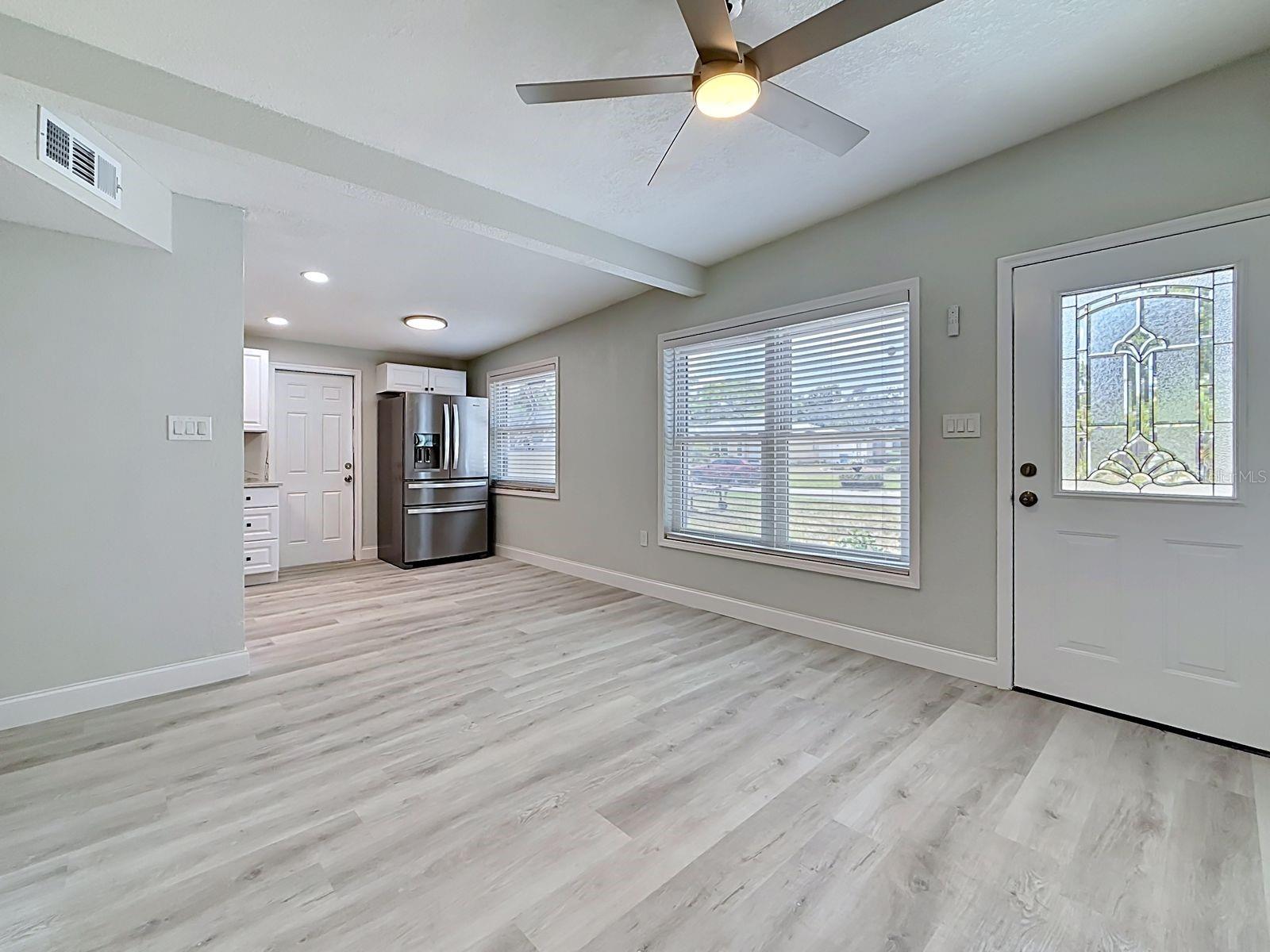 Open Floor Plan - View from living room into dining area and kitchen