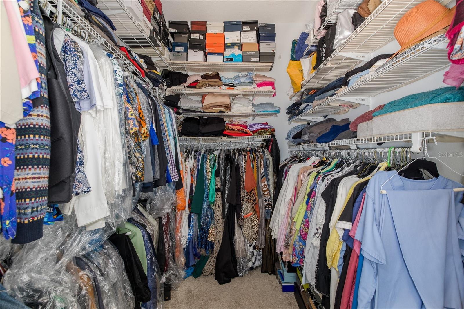 Primary bedroom walkin closet