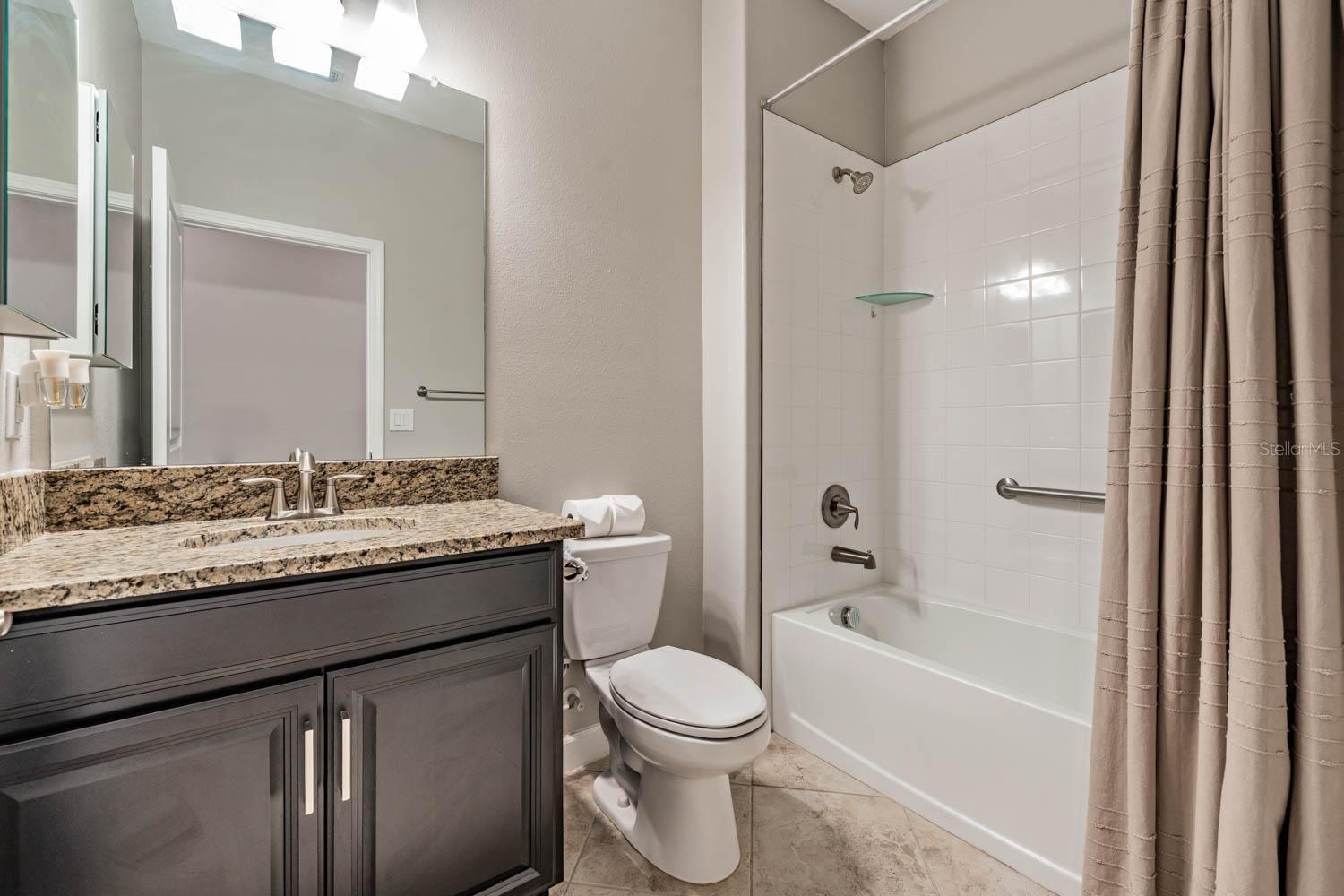 Secondary bath with granite countertops