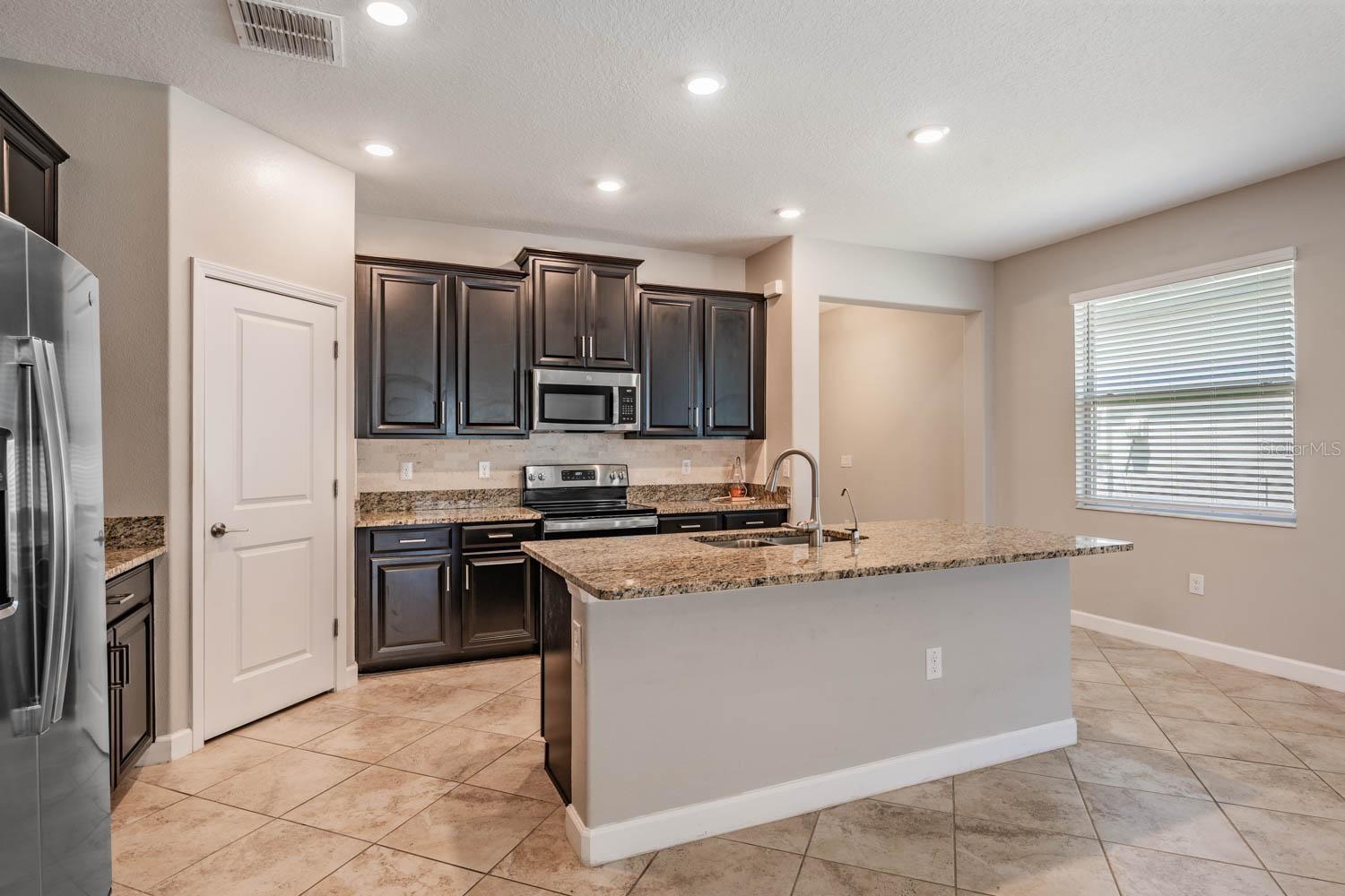 Large Kitchen Island with Granite countertops