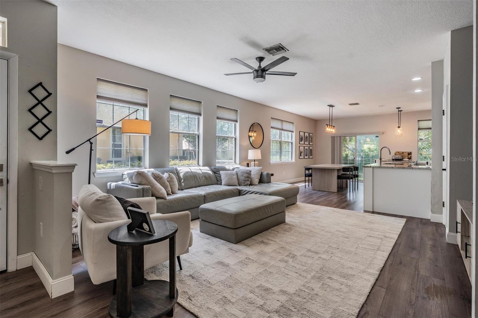 Large living space with upgraded luxury vinyl flooring