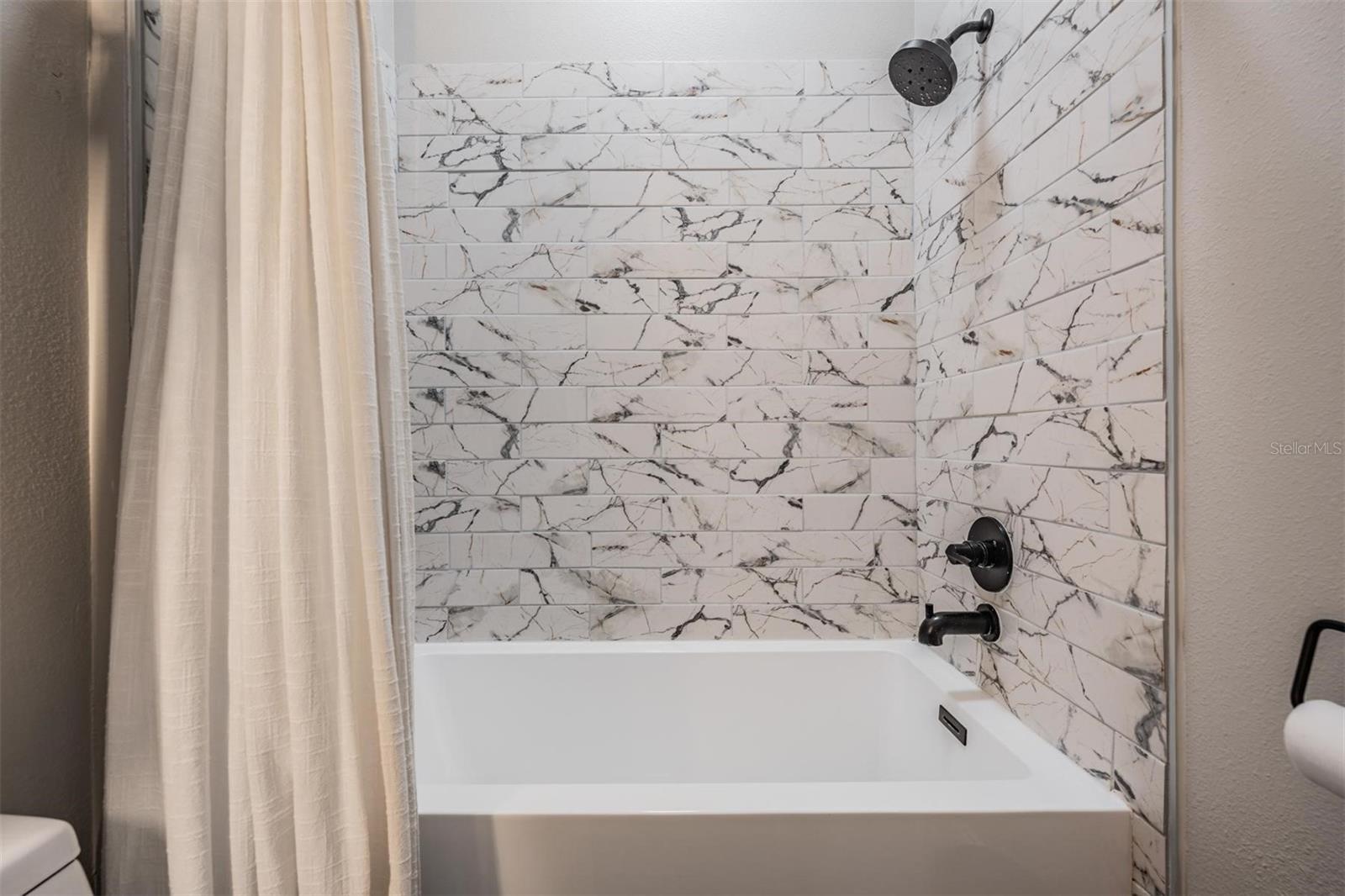 Large tub with upgraded fixtures