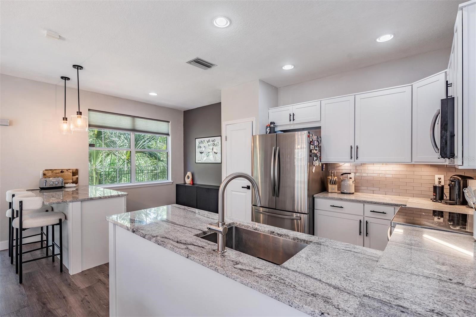 Beautiful, updated granite countertops and large stainless sink