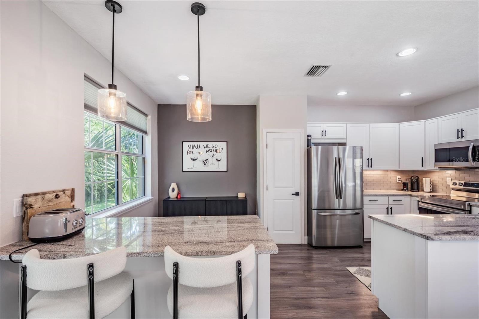 Extended Kitchen with upgraded lighting and cabinets