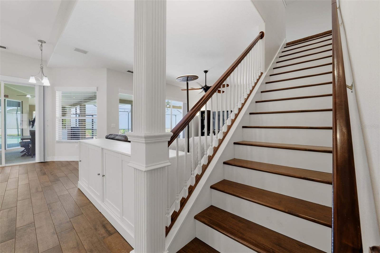 view up the stairs from bedrooms 2 and 3