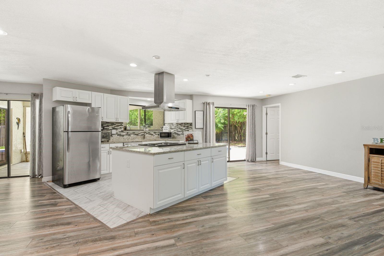 Center island with cooktop and plenty of storage!