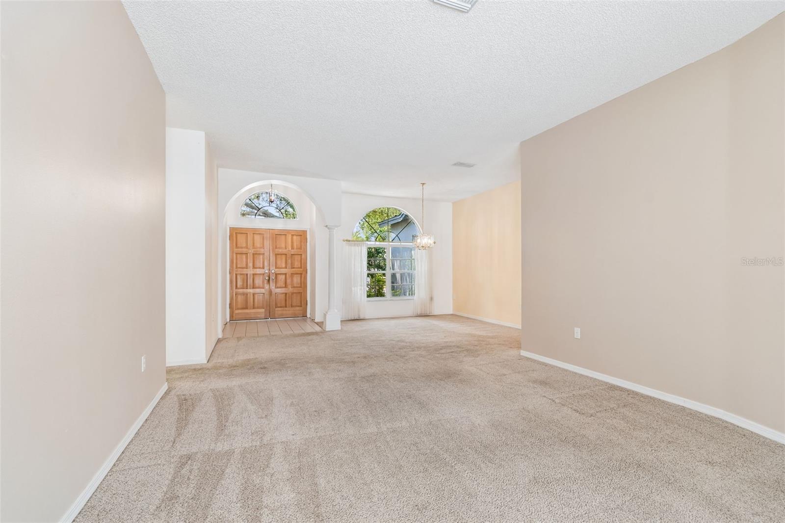 View of entry living & dining room
