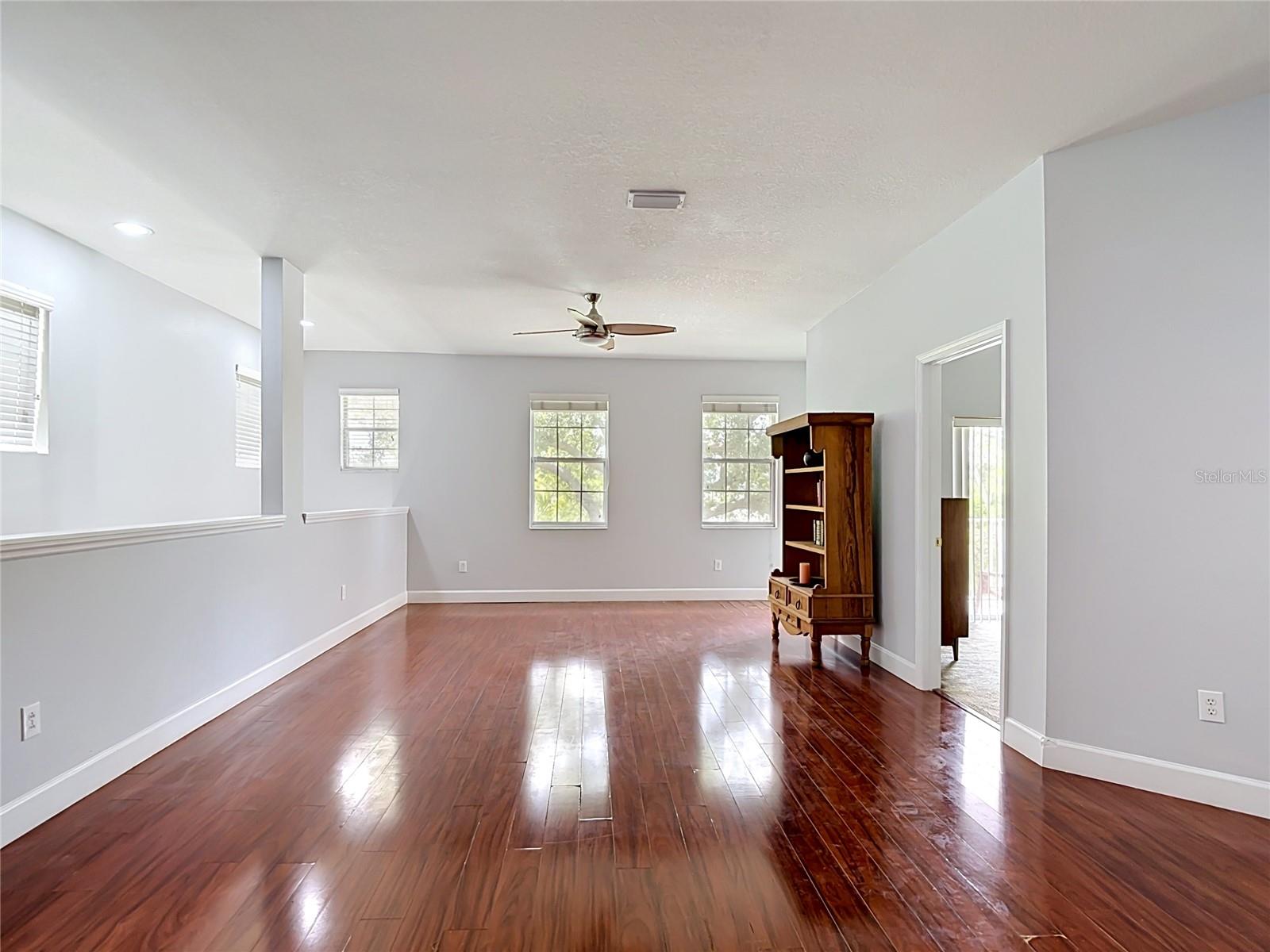 9502 W Park Village 108, Great room, primary bedroom to right, front entry stairwell to left