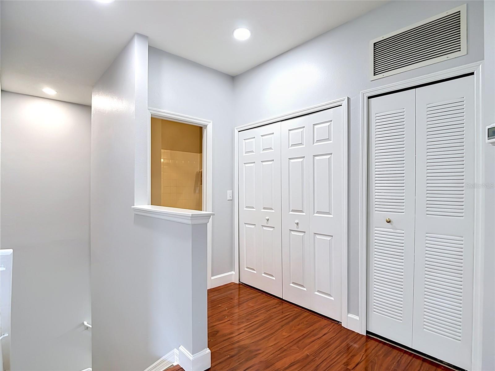 9502 W Park Village 108 hallway access to laundry and 2nd bathroom