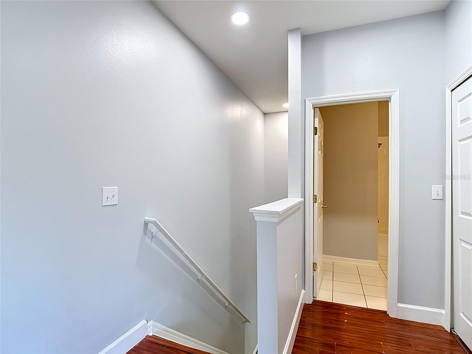 9502 W Park Village 108 2nd bath entry and top of back stairs that go to garage