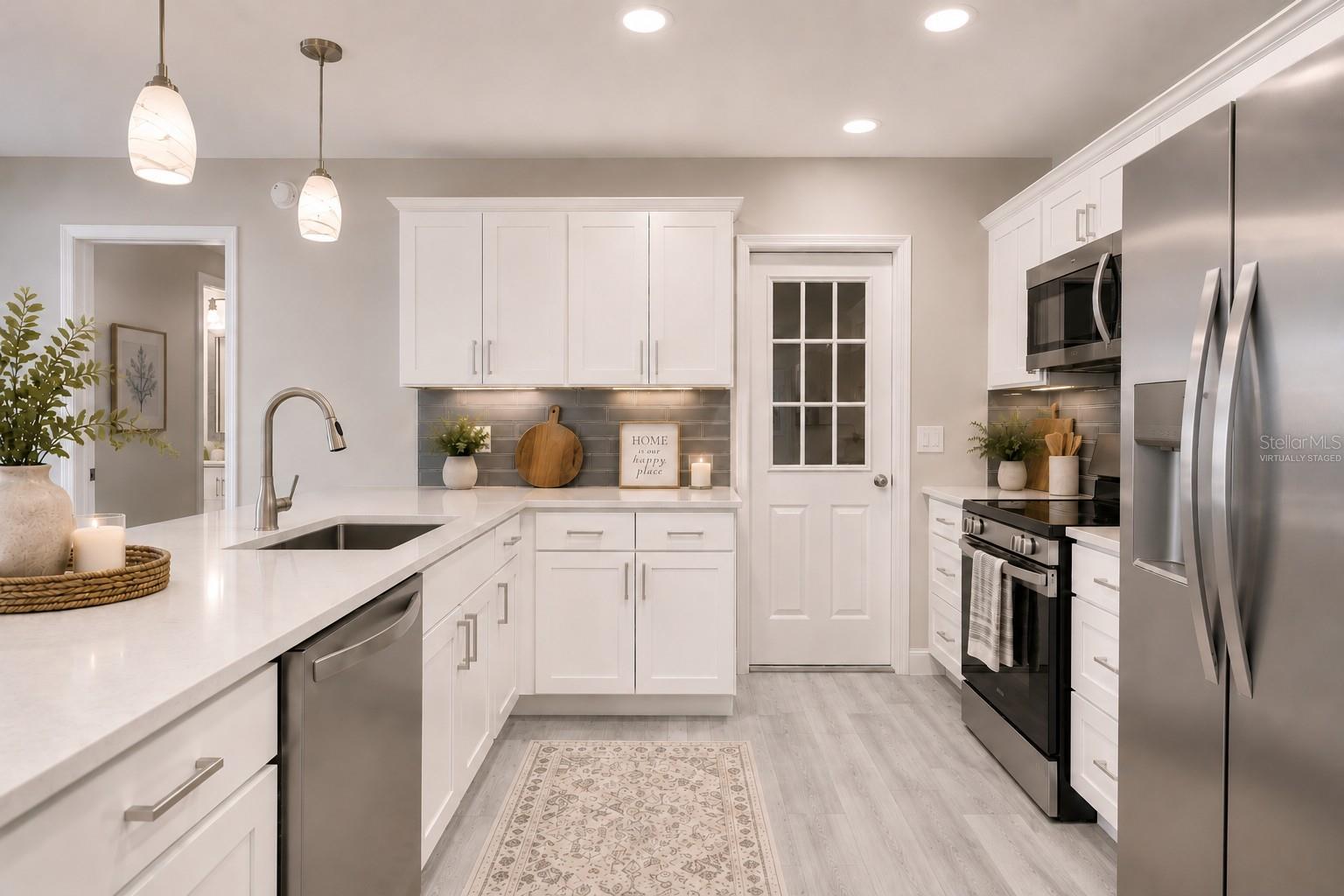 Virtually Staged - Beautiful New Cabinets, Appliances, Sink, Backsplash, New Granite Countertops and recessed lighting!