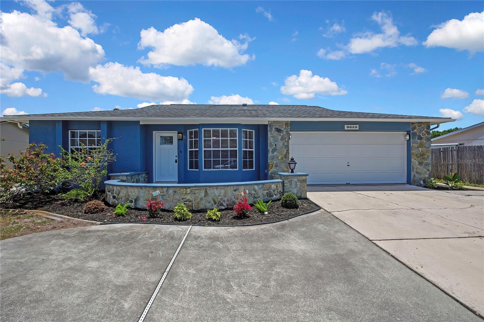 Front - New Garage Door, Front door and Outside Lighting!