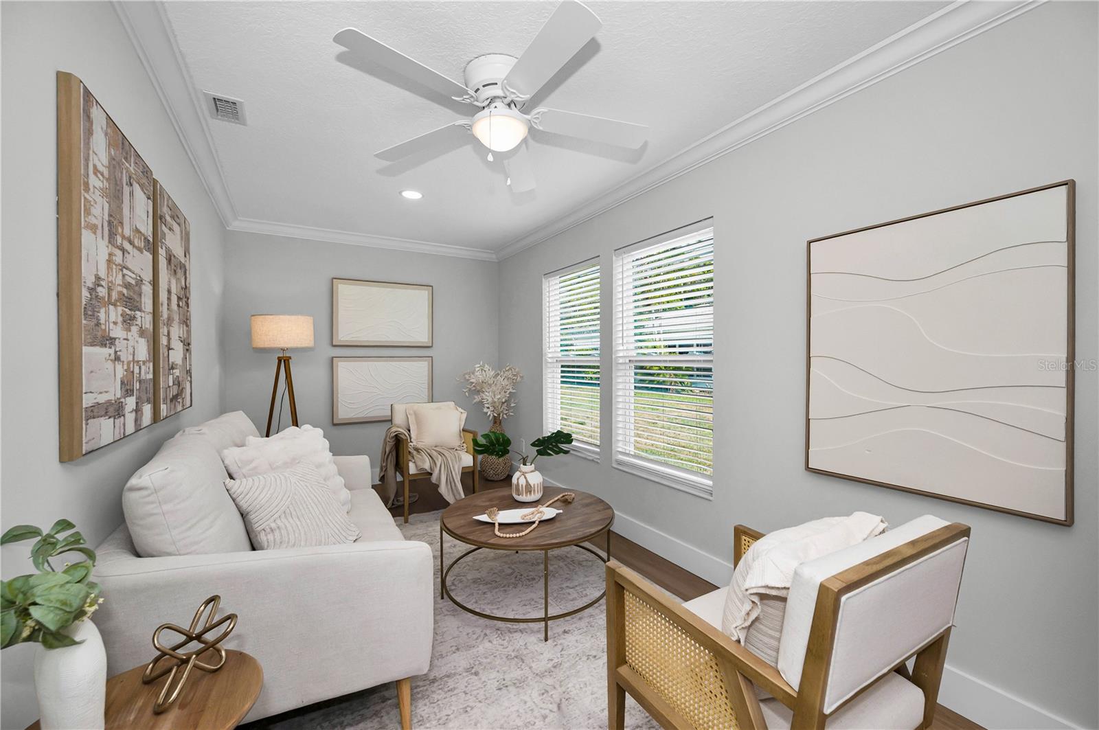 This bonus room offers space for additional entertaining or a home office.