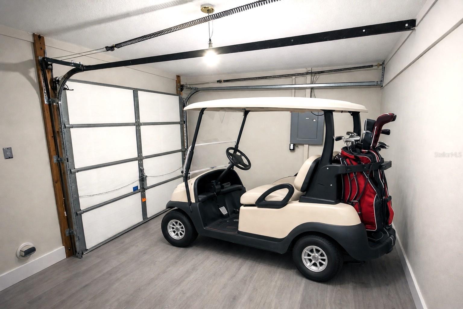BYOGC (Bring your own golf cart!) with its own separate garage door!