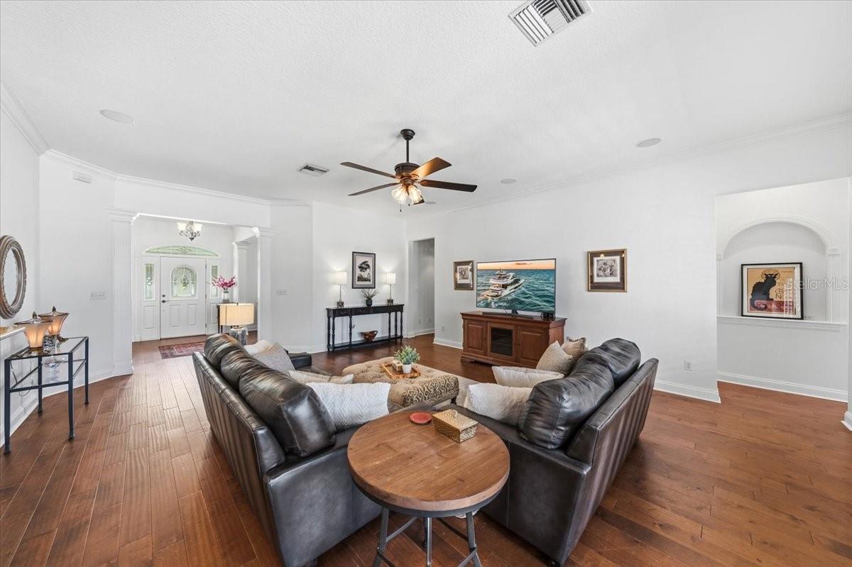 Expansive gathering space connected to kitchen and outdoor living