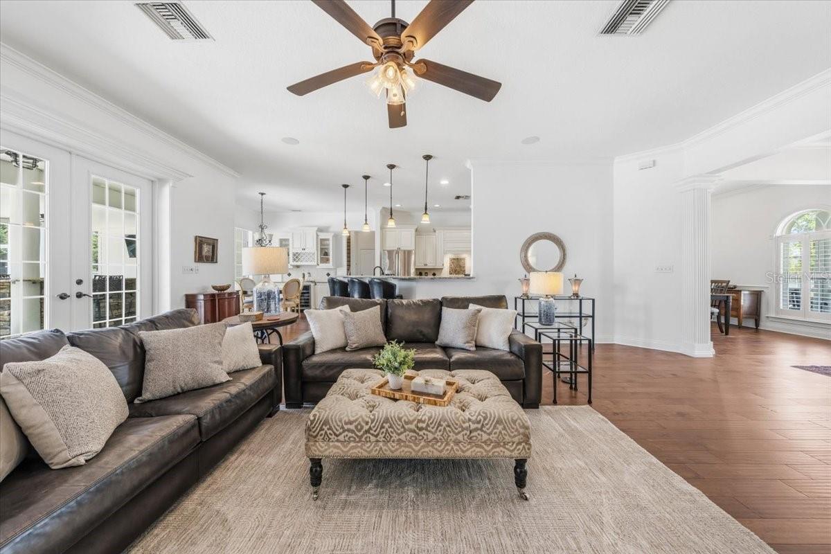 Family Room with seamless flow through kitchen and dining area.