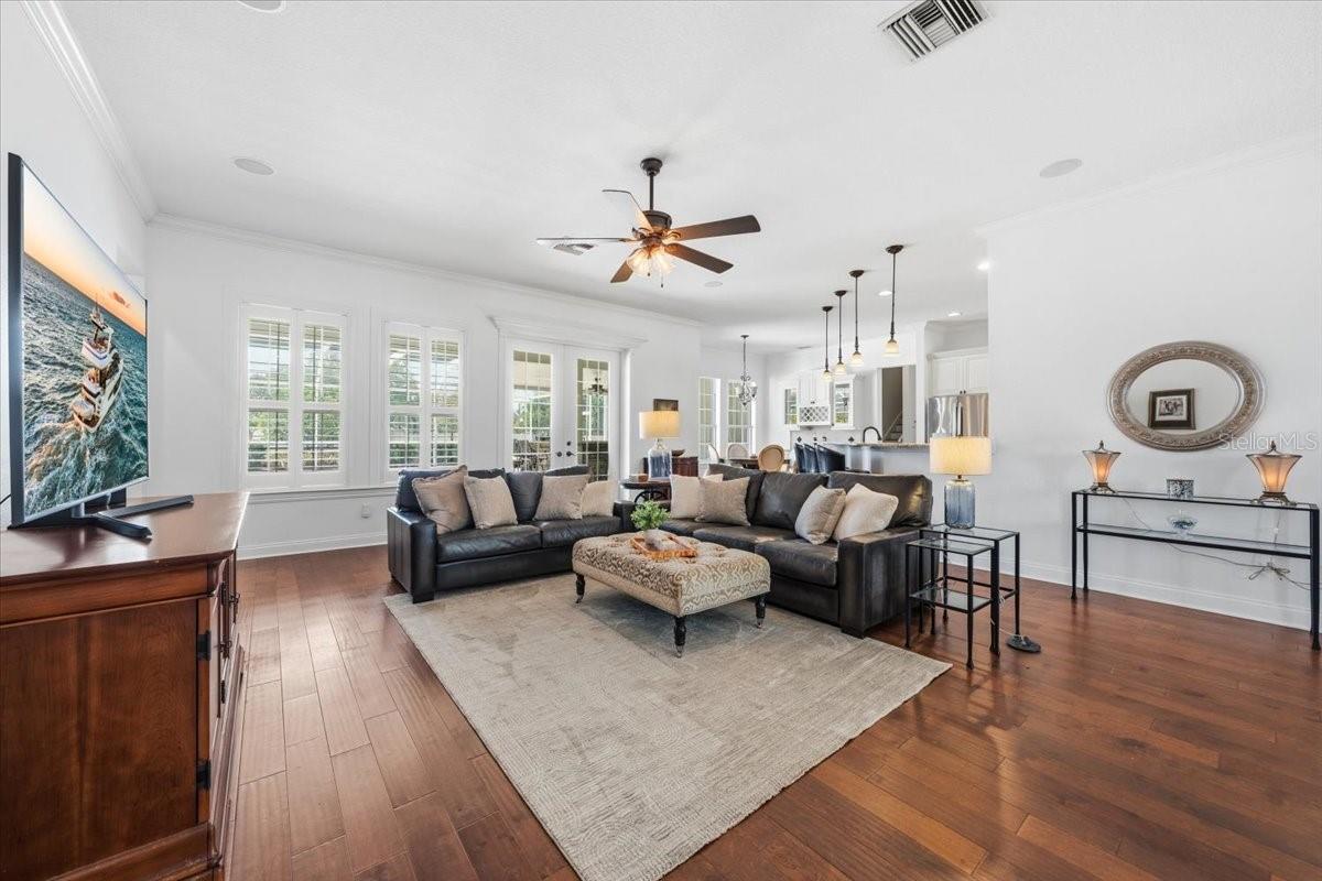 New wood flooring, carpet, and updated tile work enhancing the home’s appeal