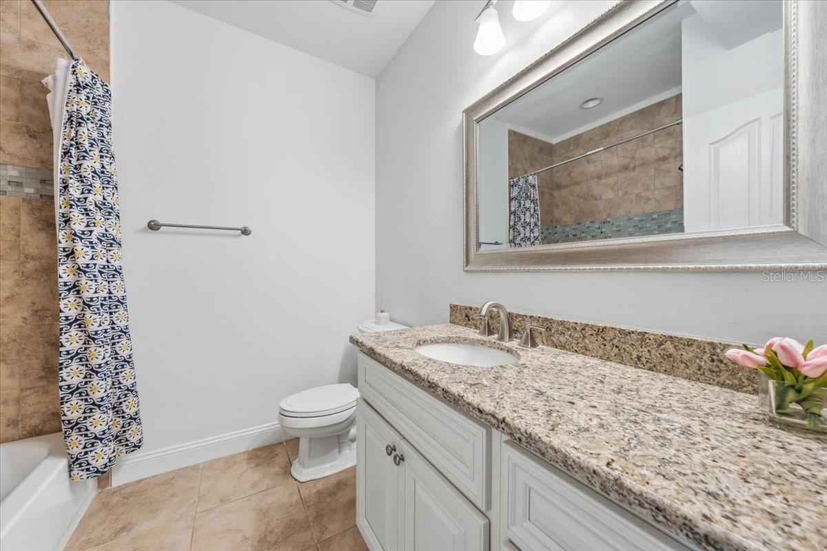 Well-appointed bathrooms designed for functionality and privacy