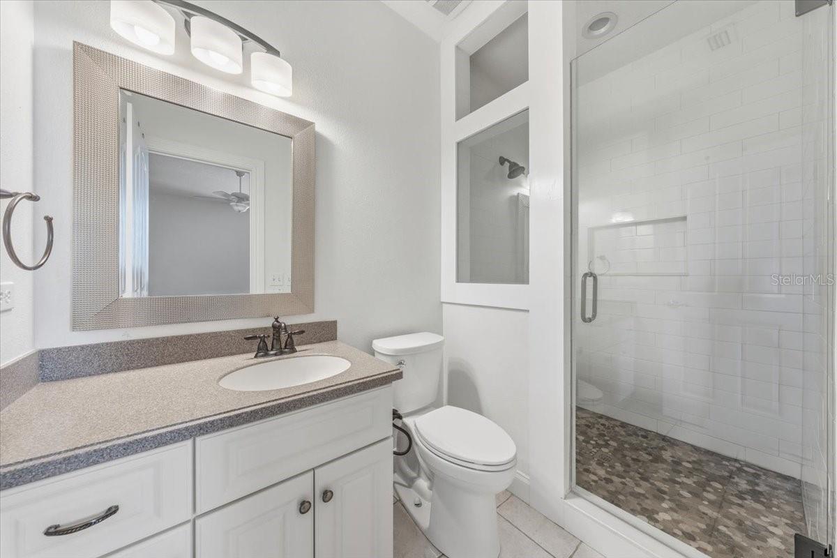 Bathroom of bonus room.