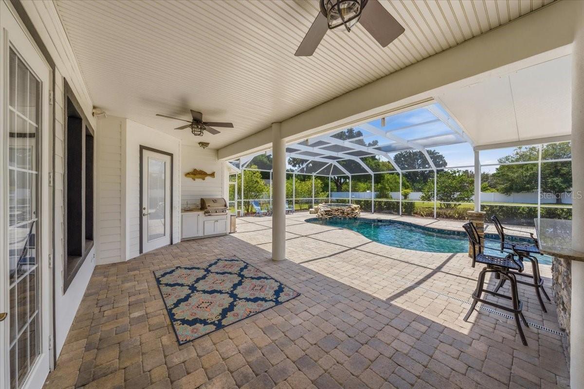 Resort-style screened outdoor living space