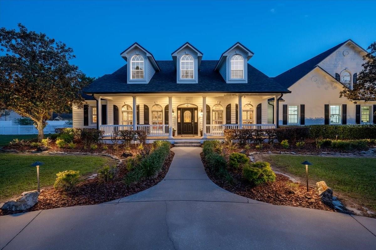 Welcoming porch overlooking peaceful surroundings