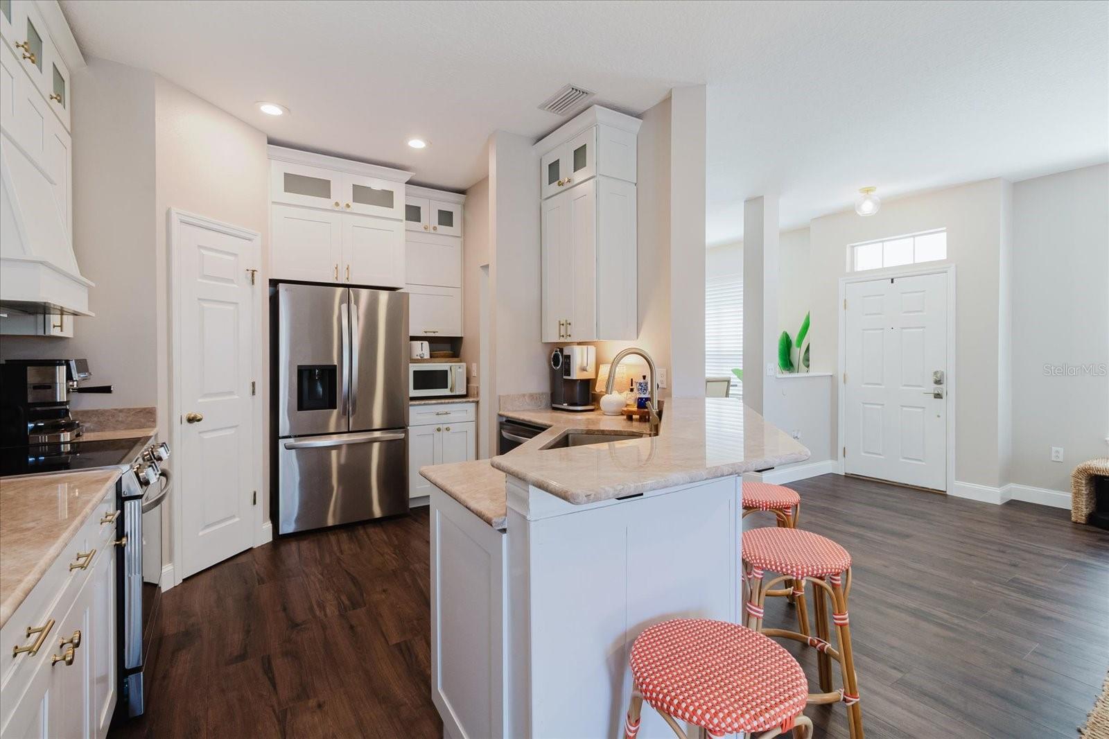 This Kitchen Looks Like It Belongs In Magazine! Quartzite Counters, Stainless Steel Appliances, Kraftmaid Dovetailed, Soft Close Cabinetry, & A Walk In Panty