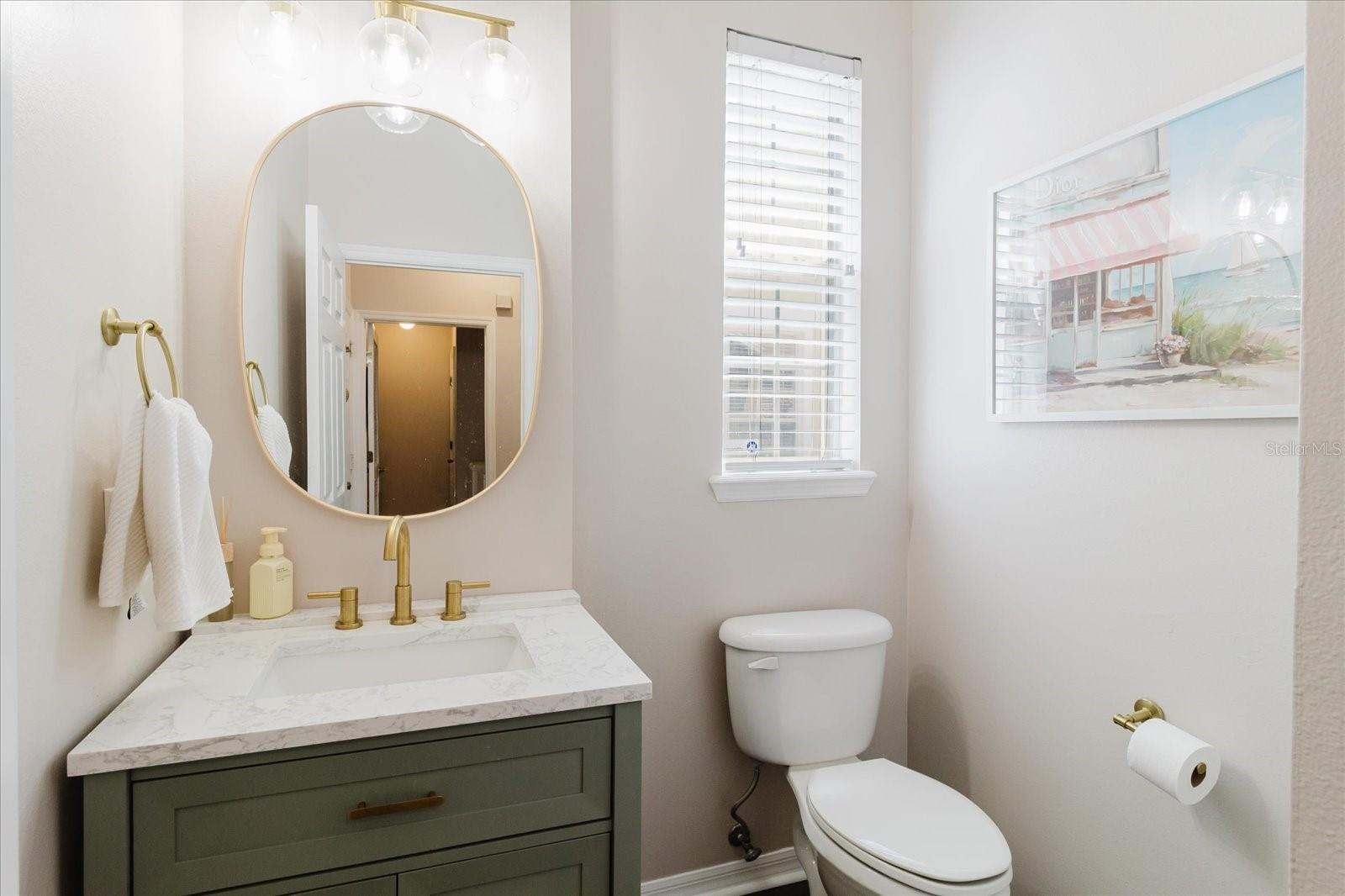 Updated Downstairs Half Bath With Luxury Vinyl Floors