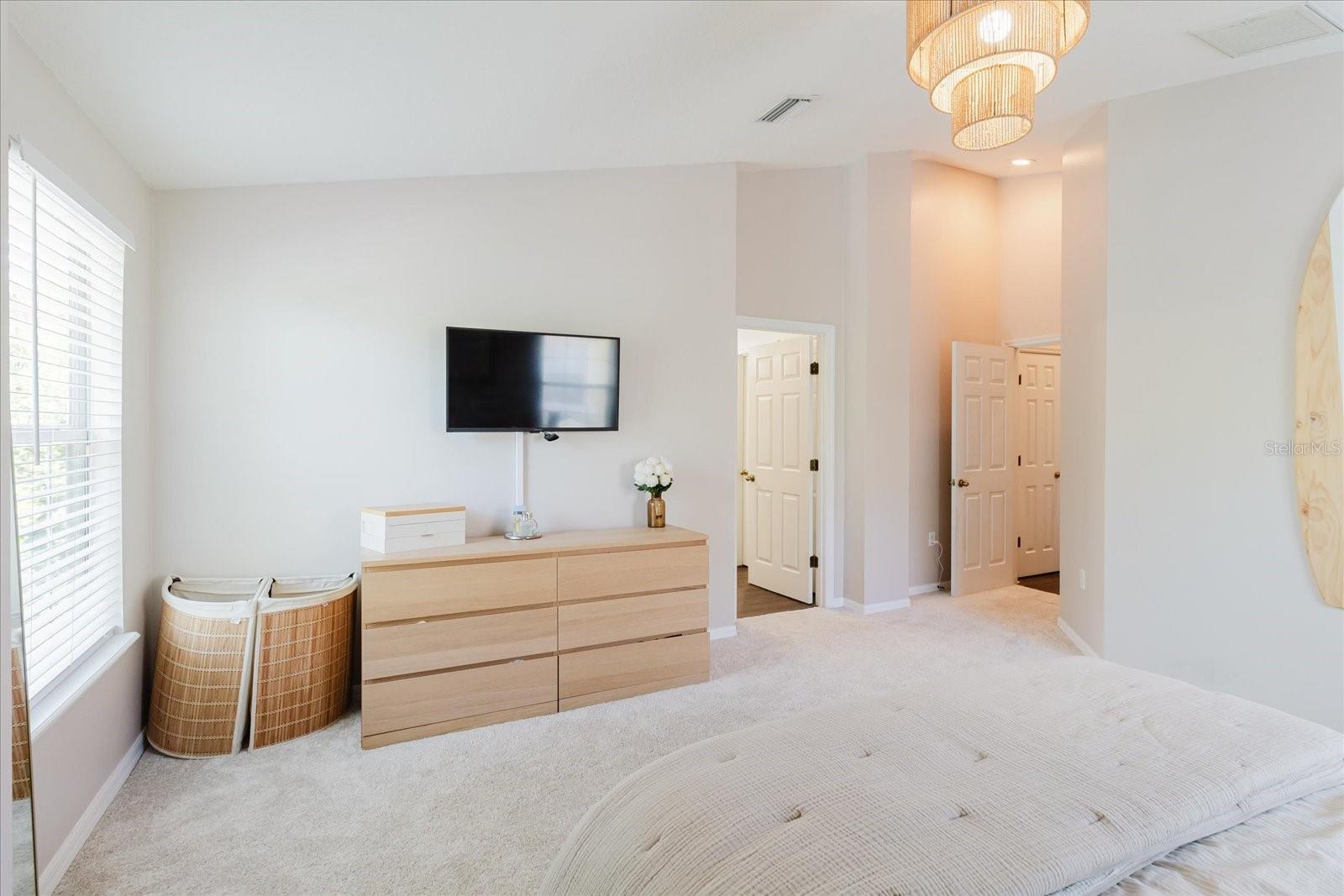 Primary Ensuite Bedroom. Plenty of Room For A King Size Bed. Plush Carpeting With Premium Tempur-Pedic Padding. View of The Ensuite Bathroom