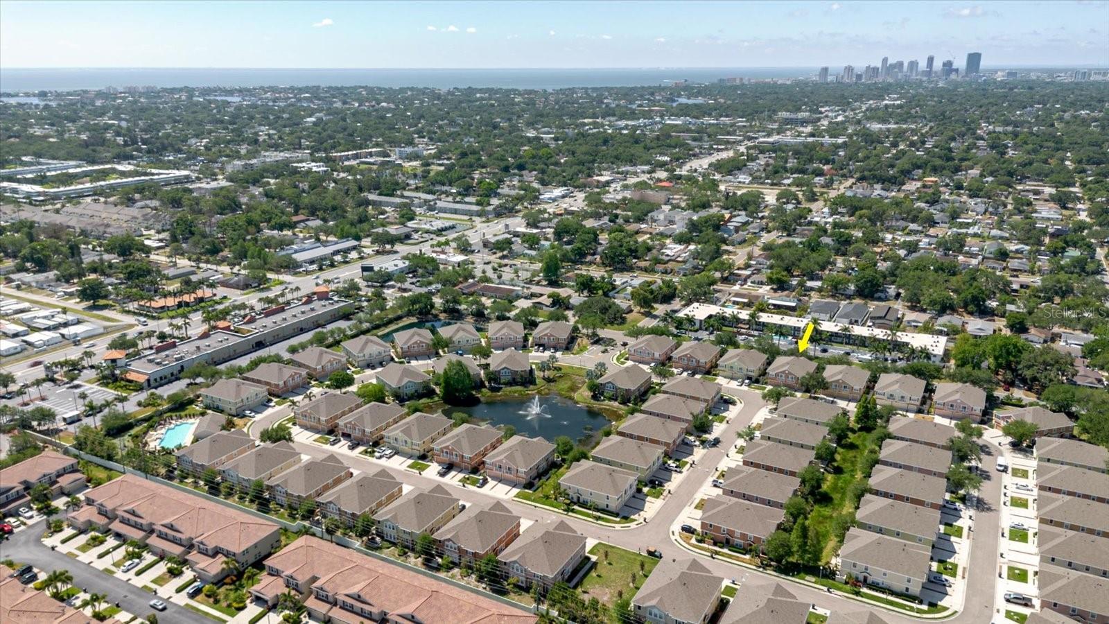 Property Marked With Yellow Arrow & Proximity Of The Pool, Downtown St Petersburg, & Tropicana Fields. To The Left Of The Community Is 4th St N, Makes For Easy Access To Downtown, Tampa, Or The Airports