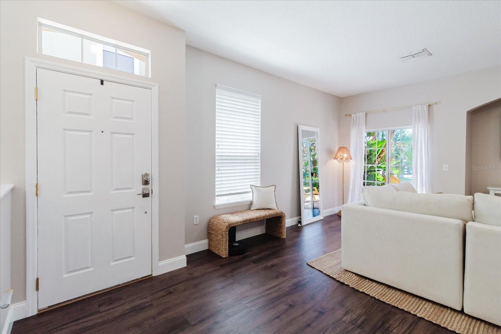 Foyer with View Of The Living Room
