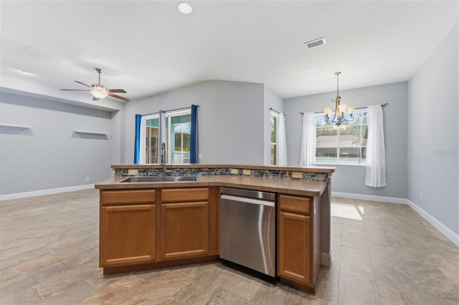 Large kitchen island with stainless steel sink