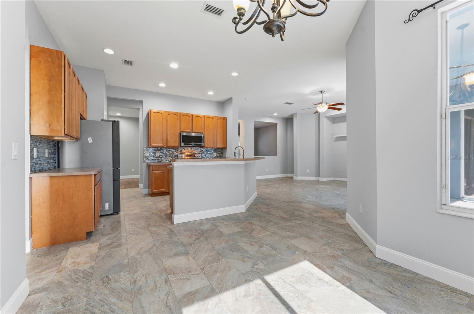 View from the casual dining area towards kitchen