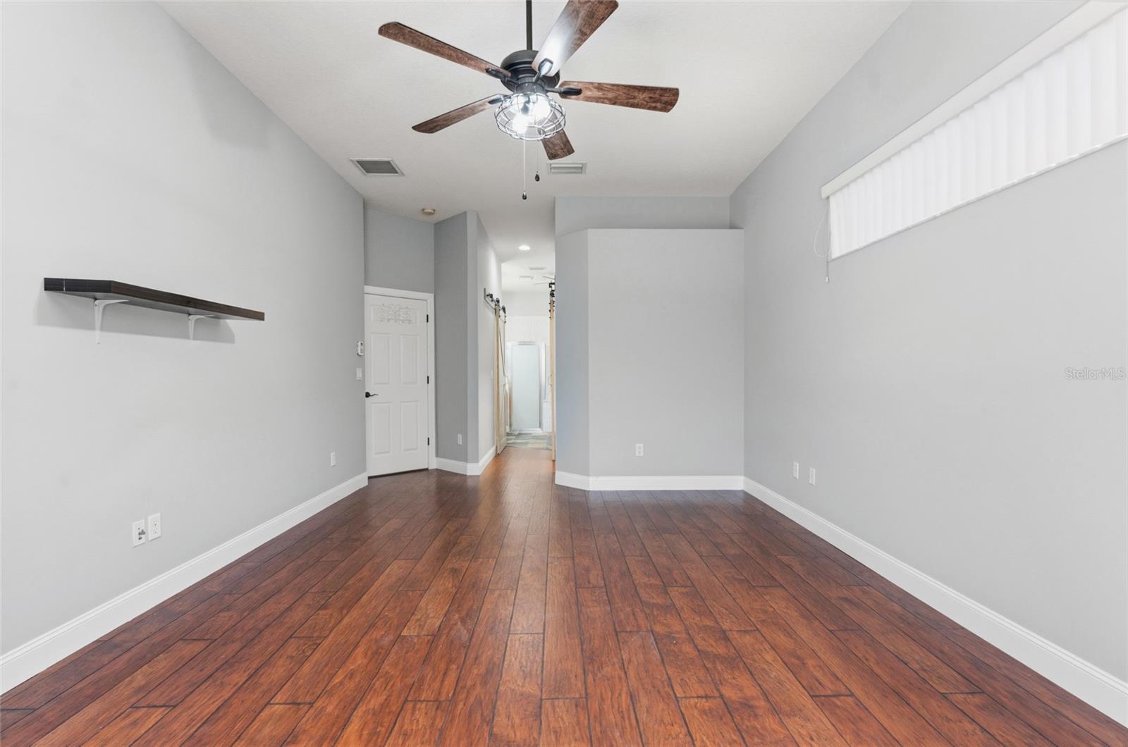 Pass the dual walk-in closets to the primary bath