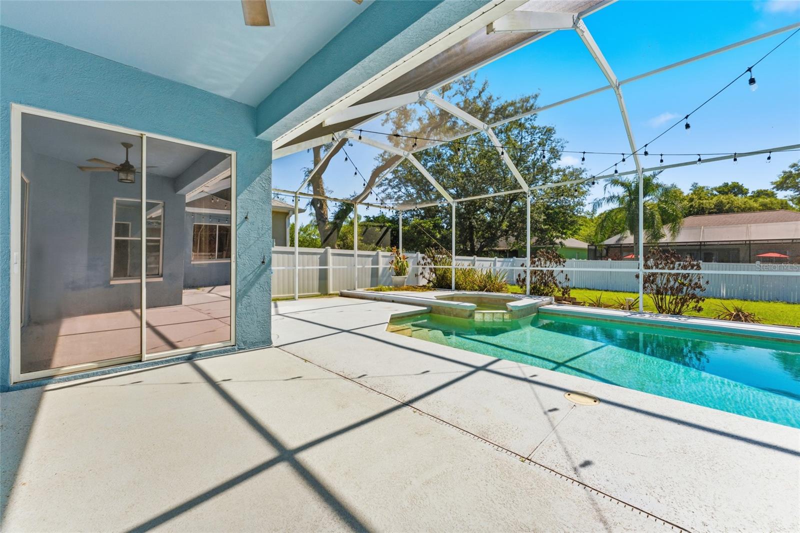 Over 1,000sqft screen-enclosed lanai with saltwater pool