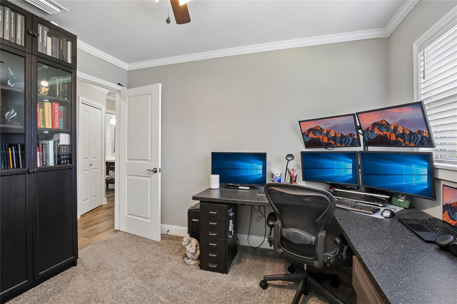 Bedroom Three Office View – This secondary bedroom provides generous wall space, natural light, and a comfortable layout for a dedicated work-from-home setup. Neutral finishes make the space easy to personalize.